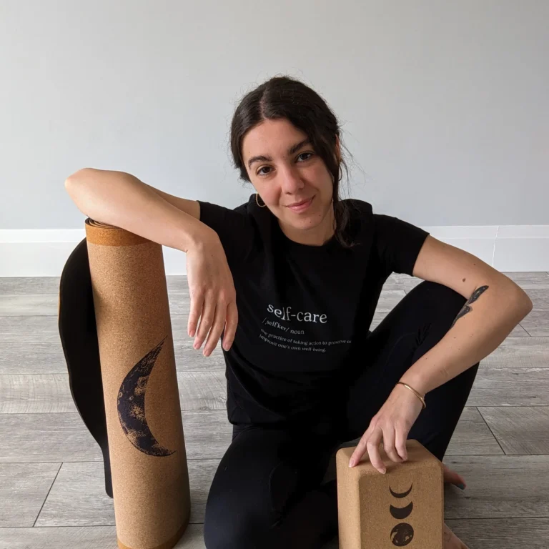 Woman resting in a supported Yoga Nidra practice